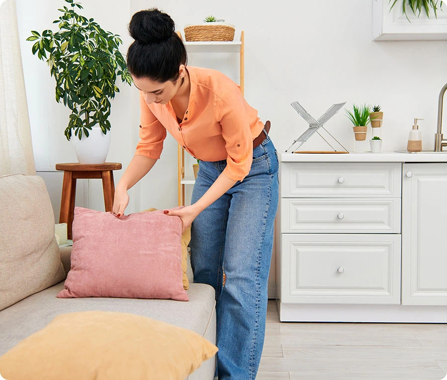 Cleaning an apartment using a step-by-step cleaning checklist and supplies